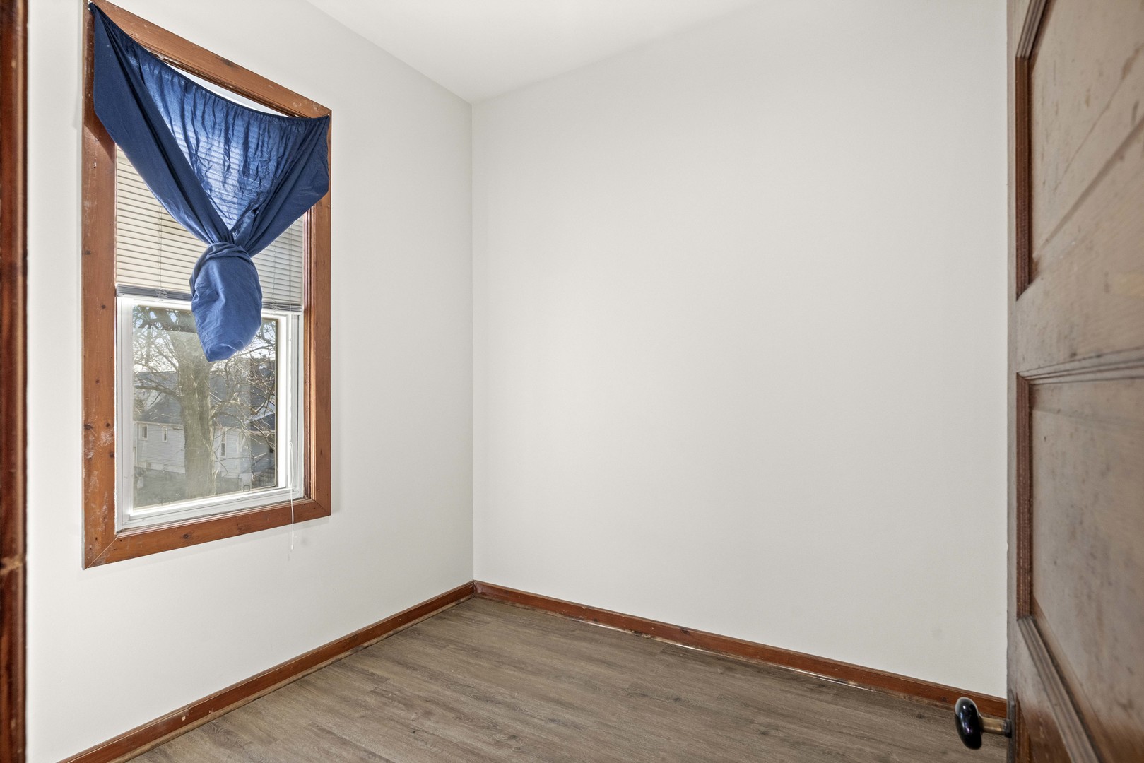2922 East 97th Street Chicago, IL 60617 - Photo 4 of 20 a view of front door and wooden floor