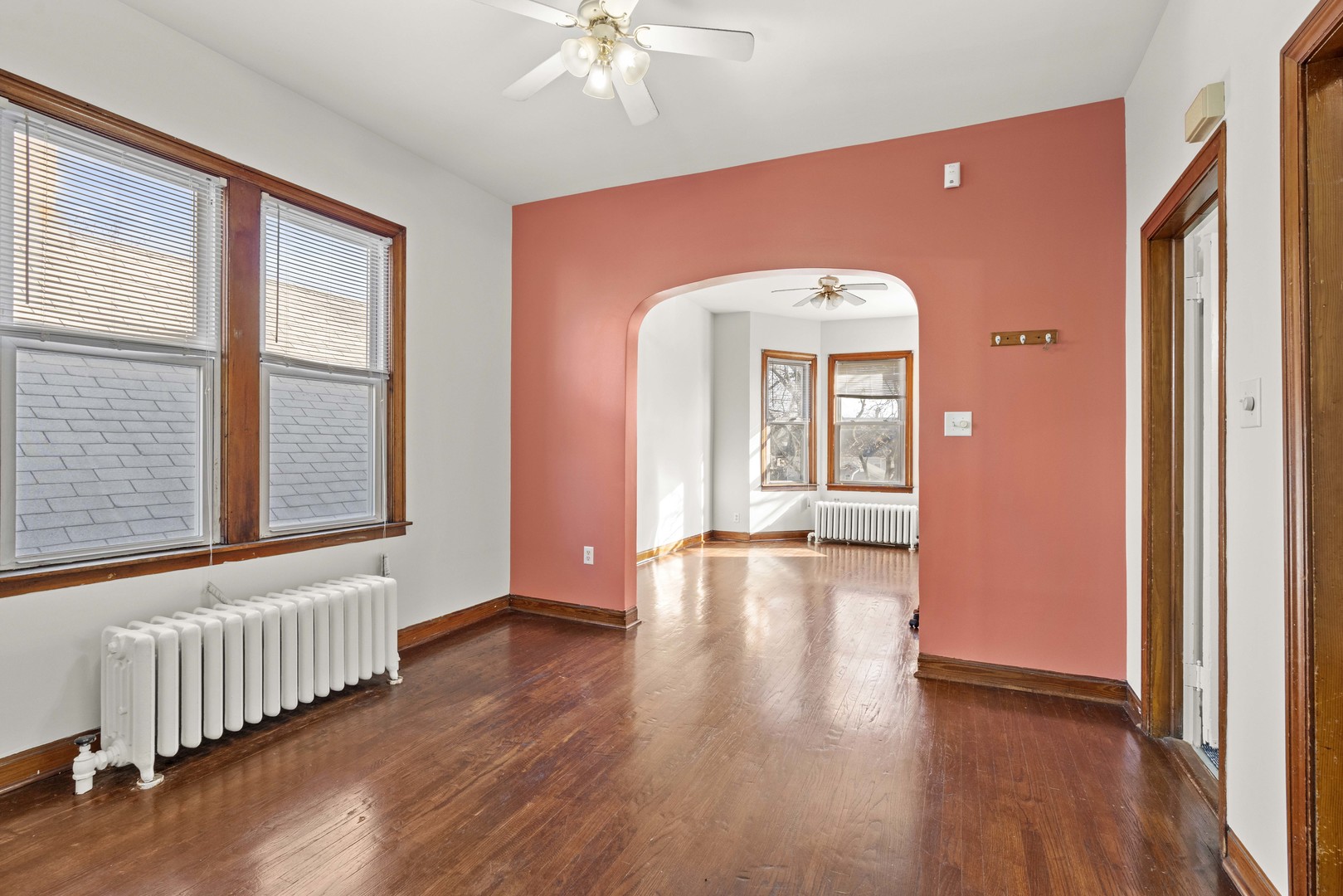2922 East 97th Street Chicago, IL 60617 - Photo 7 of 20 a view of livingroom with furniture and wooden floor