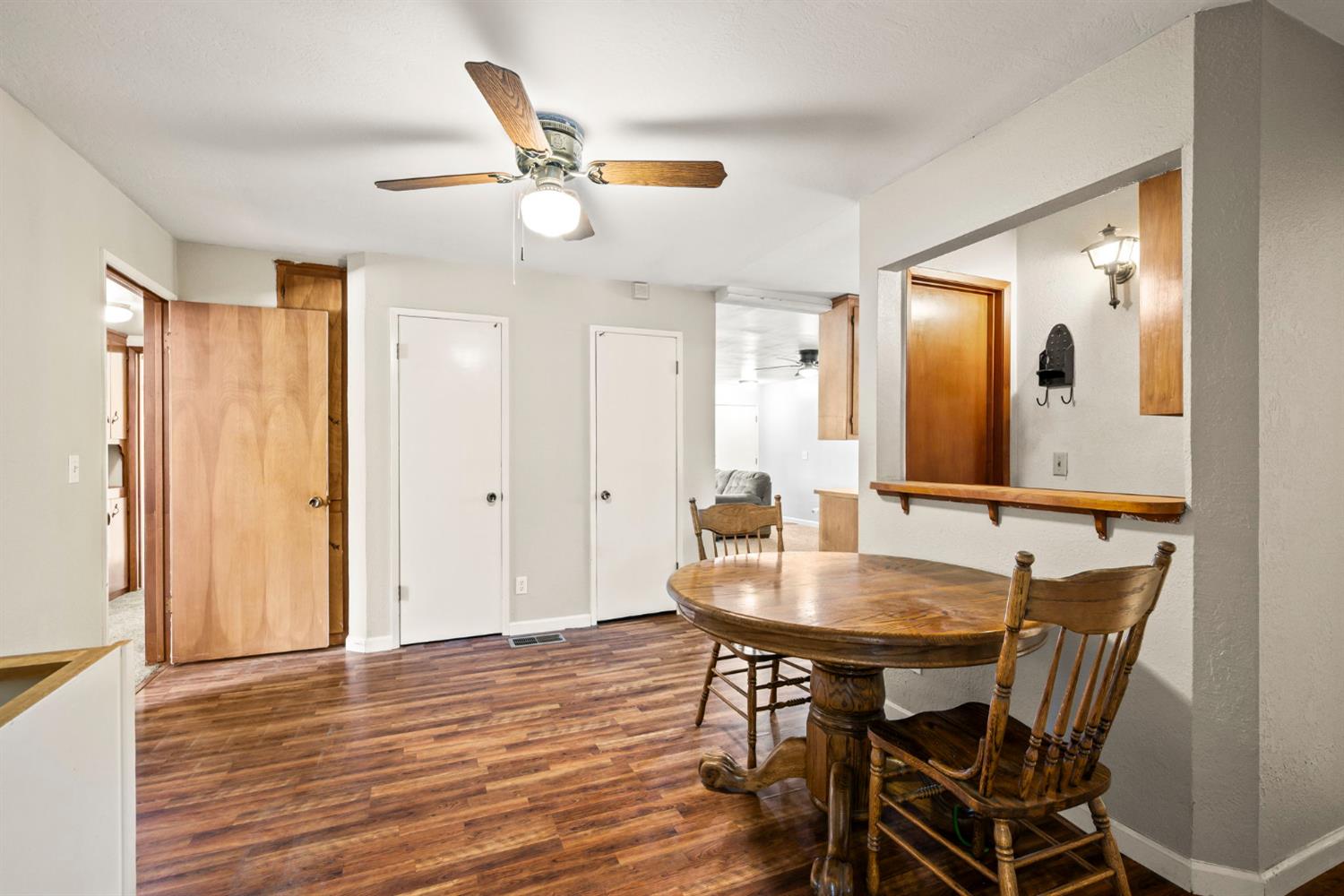 2860 Jim Valley Road Placerville, CA 95667 - Photo 14 of 34 a view of a dining room with furniture and wooden floor