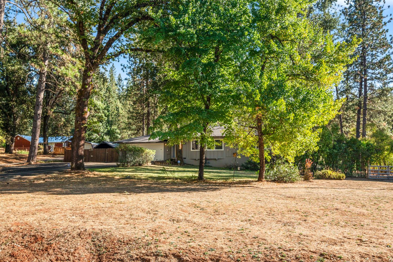 2860 Jim Valley Road Placerville, CA 95667 - Photo 2 of 34 a house with trees in the background