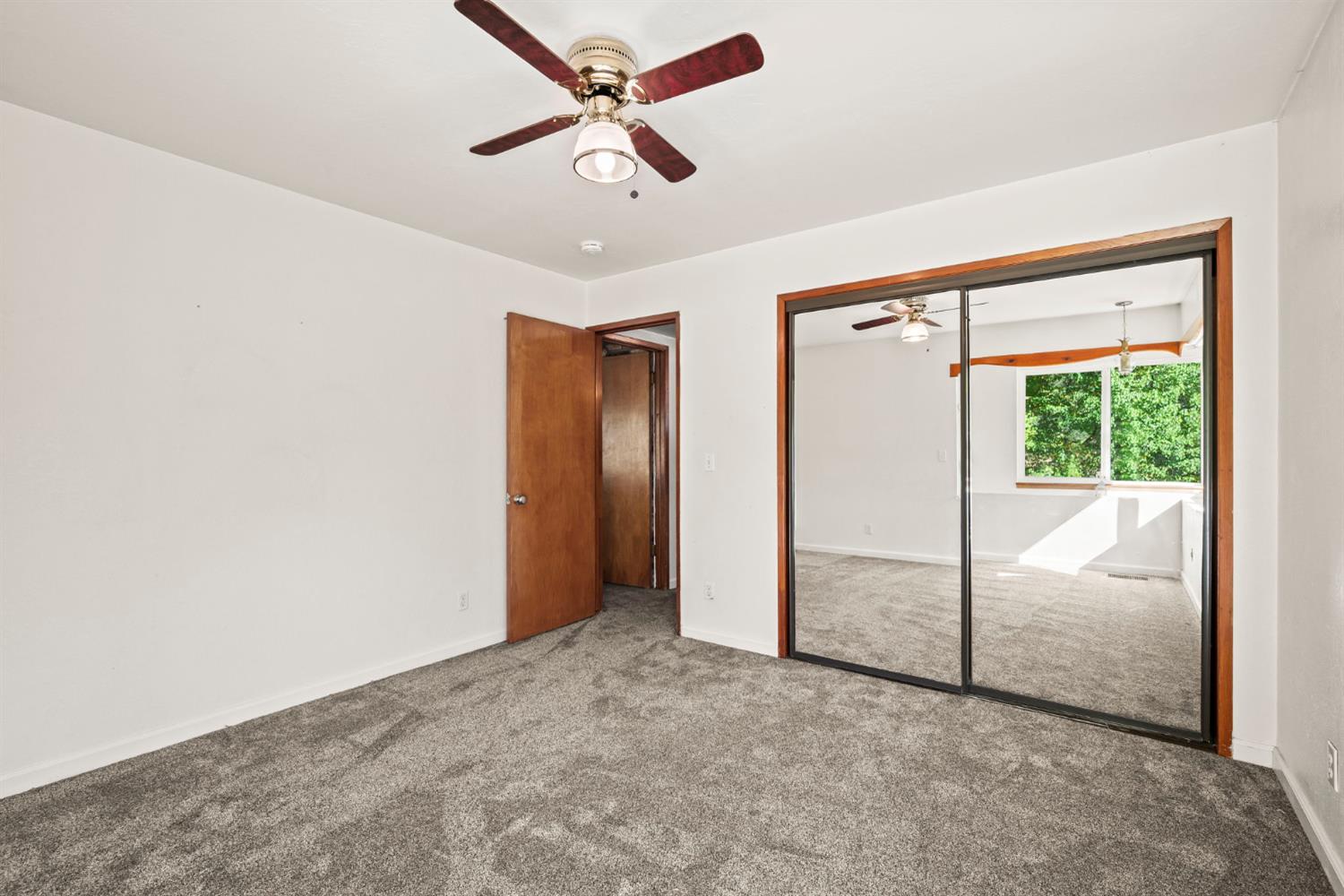 2860 Jim Valley Road Placerville, CA 95667 - Photo 22 of 34 an empty room with fan and a ceiling fan