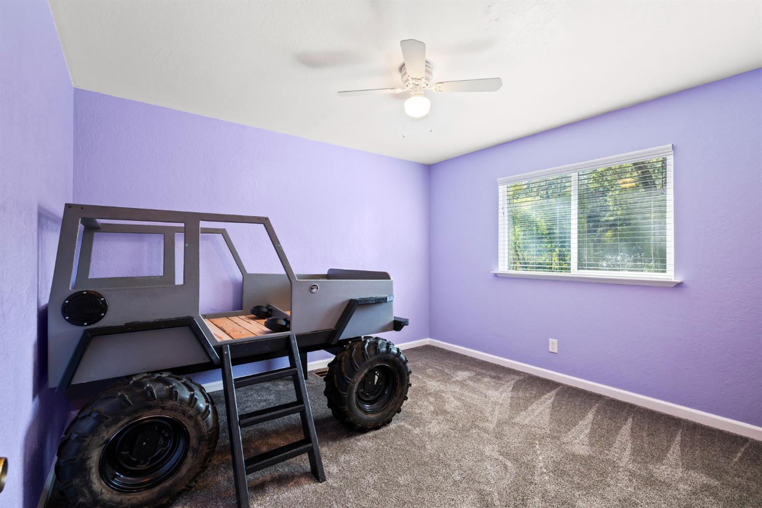2860 Jim Valley Road Placerville, CA 95667 - Photo 24 of 34 a view of a livingroom with furniture and a window