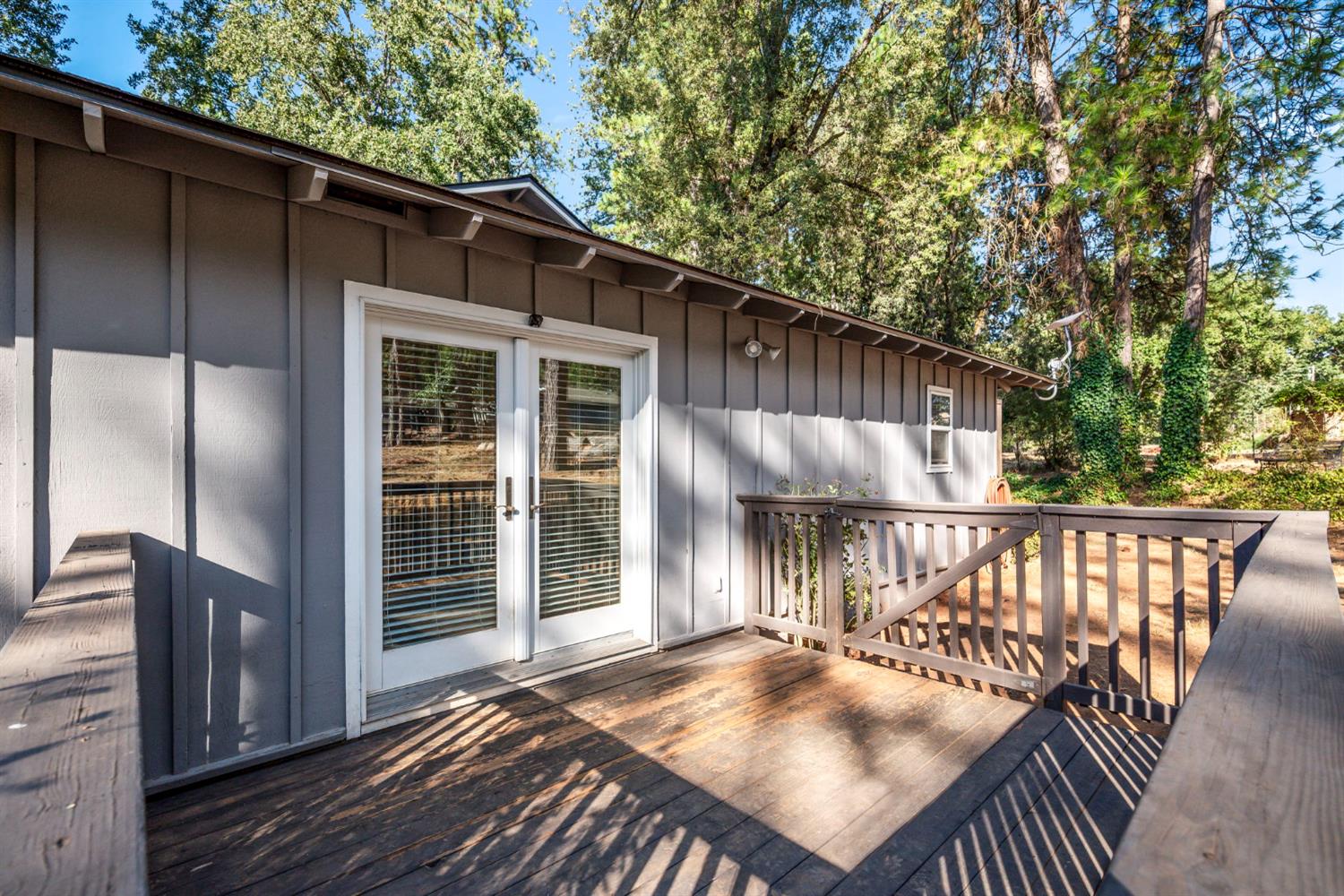 2860 Jim Valley Road Placerville, CA 95667 - Photo 28 of 34 a view of backyard with small deck and wooden floor
