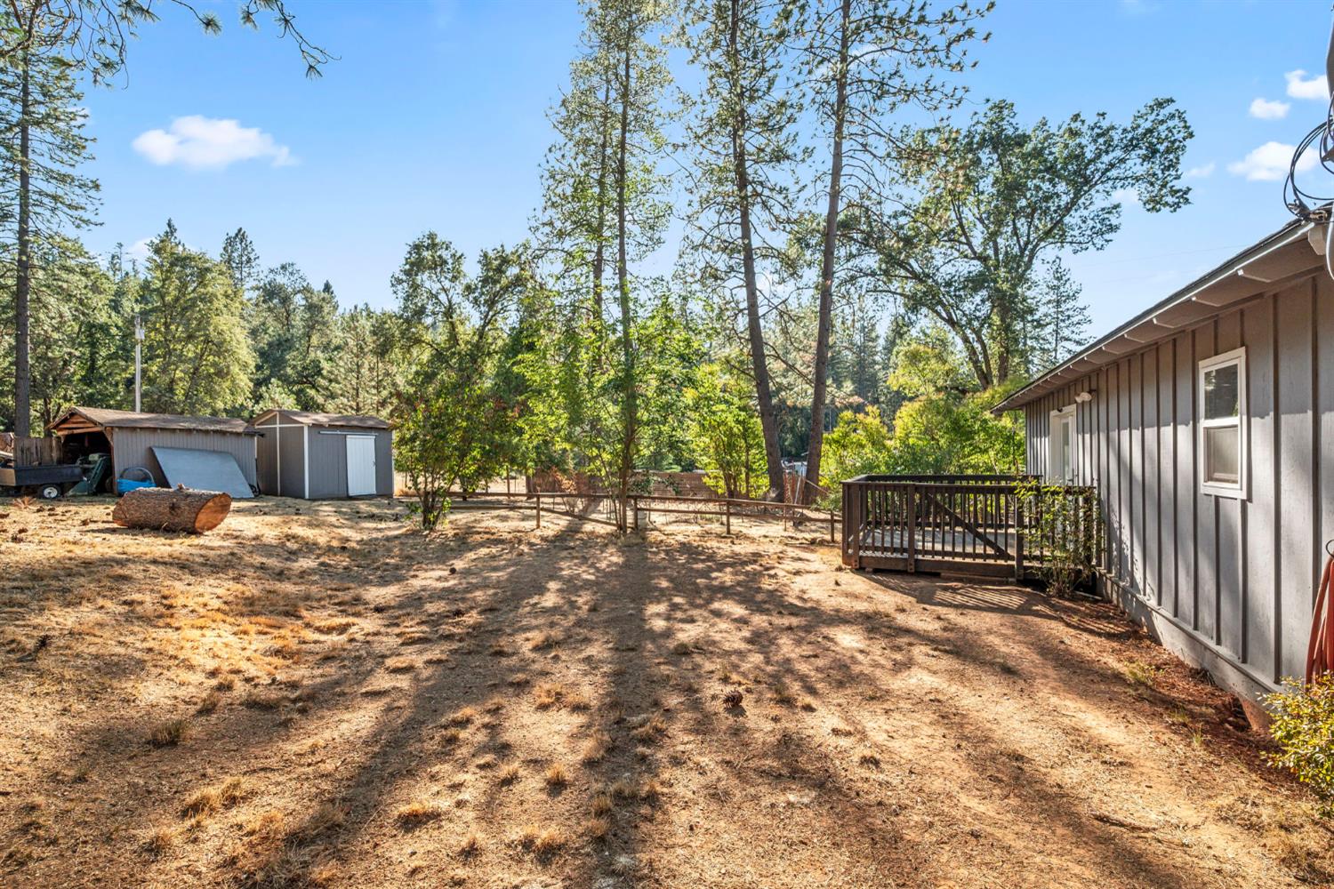 2860 Jim Valley Road Placerville, CA 95667 - Photo 31 of 34 a view of a house with wooden fence and trees