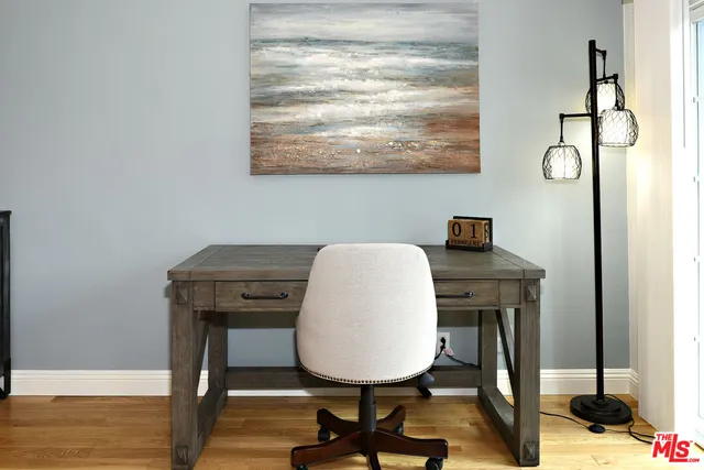 a view of a workspace with furniture