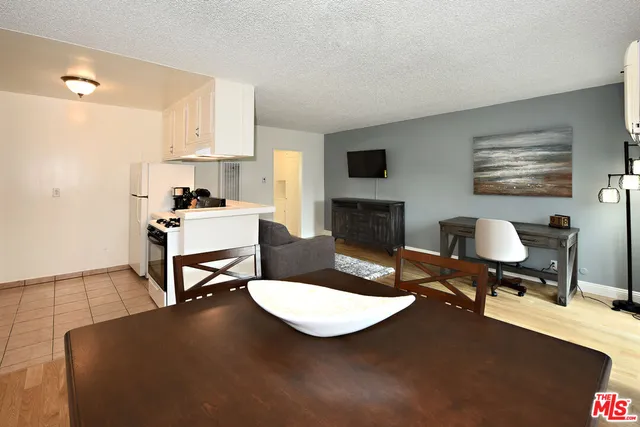 a view of a workspace with furniture