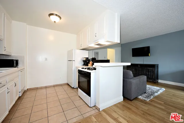 a kitchen with a cabinets and counter space