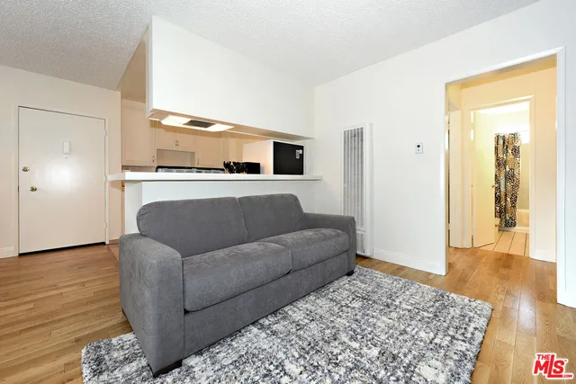 a living room with a couch and a coffee table