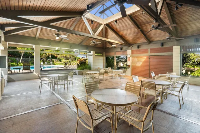 a outdoor space with lots of table and chairs