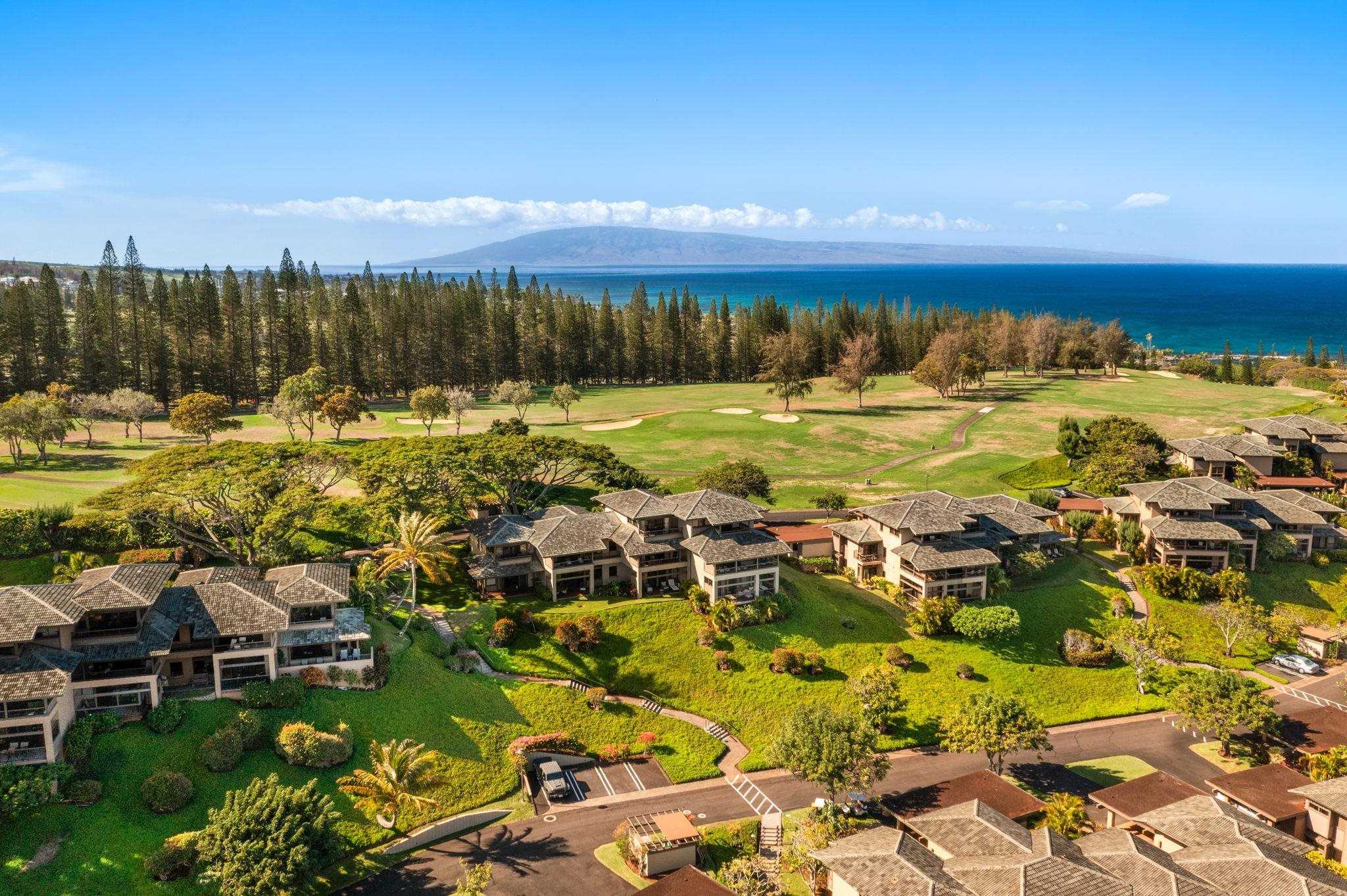 100 Ridge Road, Unit 1614 Lahaina, HI 96761 - Photo 35 of 50 a view of a city with lots of residential buildings ocean and mountain view in back