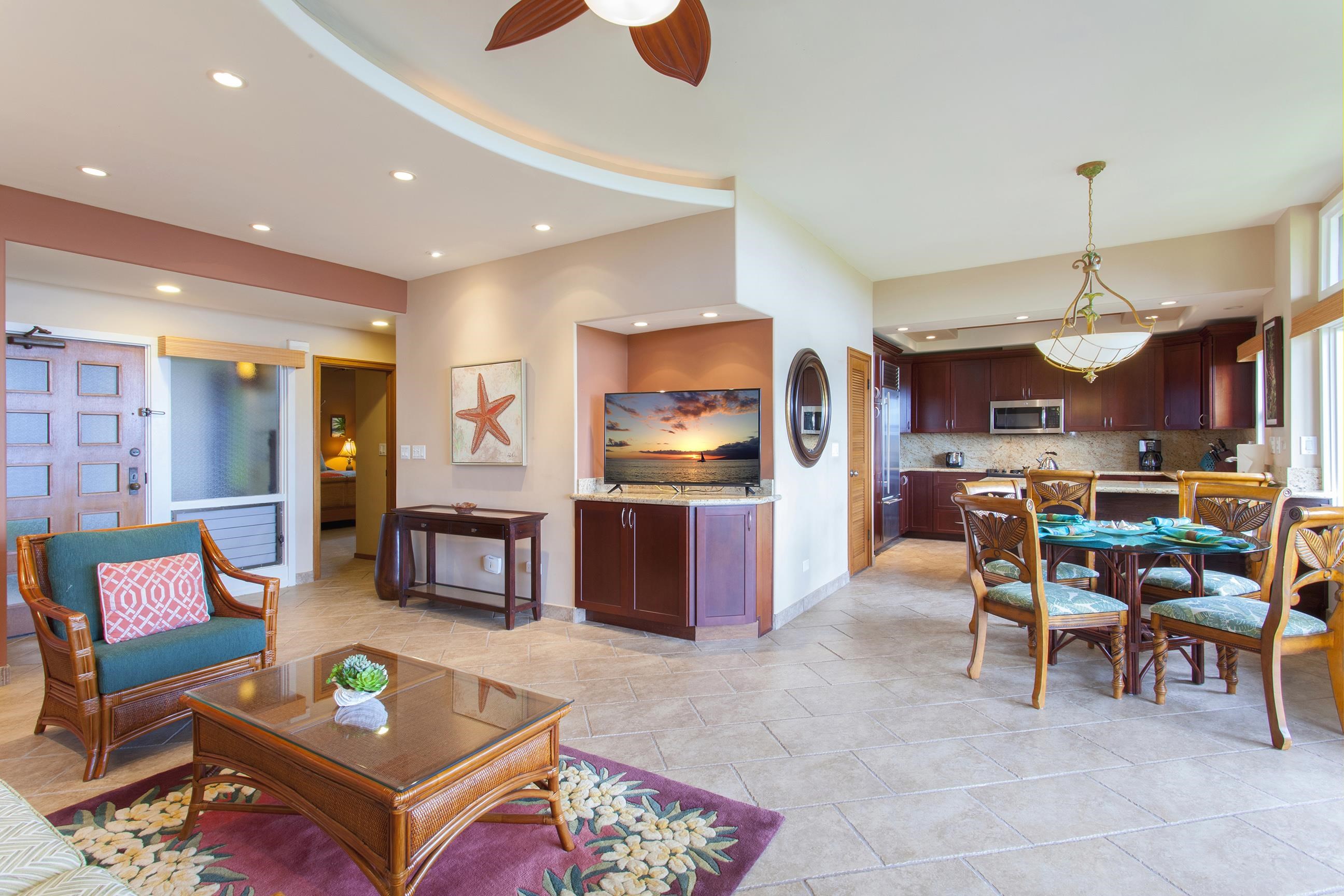 100 Ridge Road, Unit 1614 Lahaina, HI 96761 - Photo 4 of 50 a living room with furniture and kitchen view
