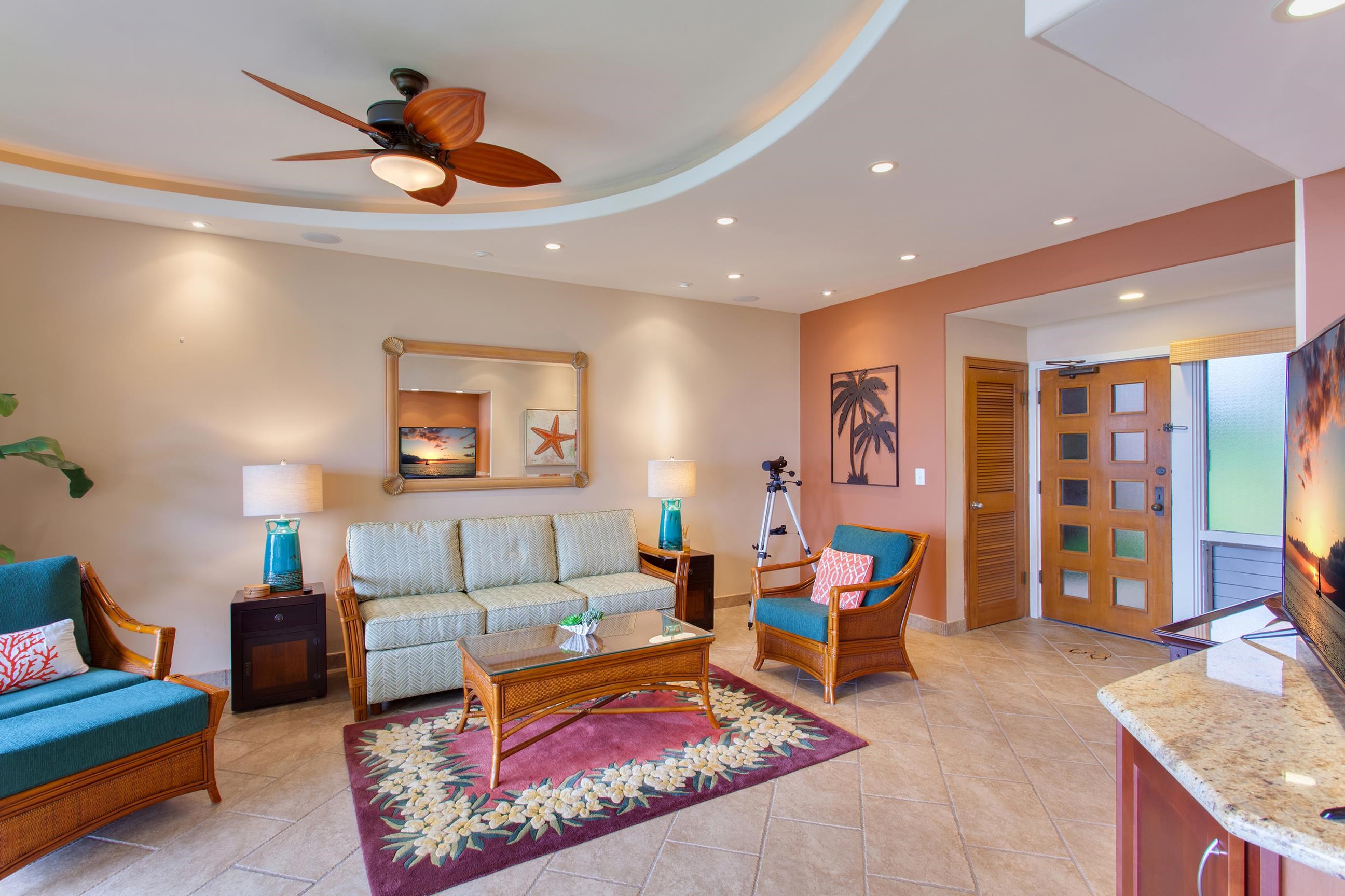 100 Ridge Road, Unit 1614 Lahaina, HI 96761 - Photo 50 of 50 a living room with furniture a rug and a chandelier