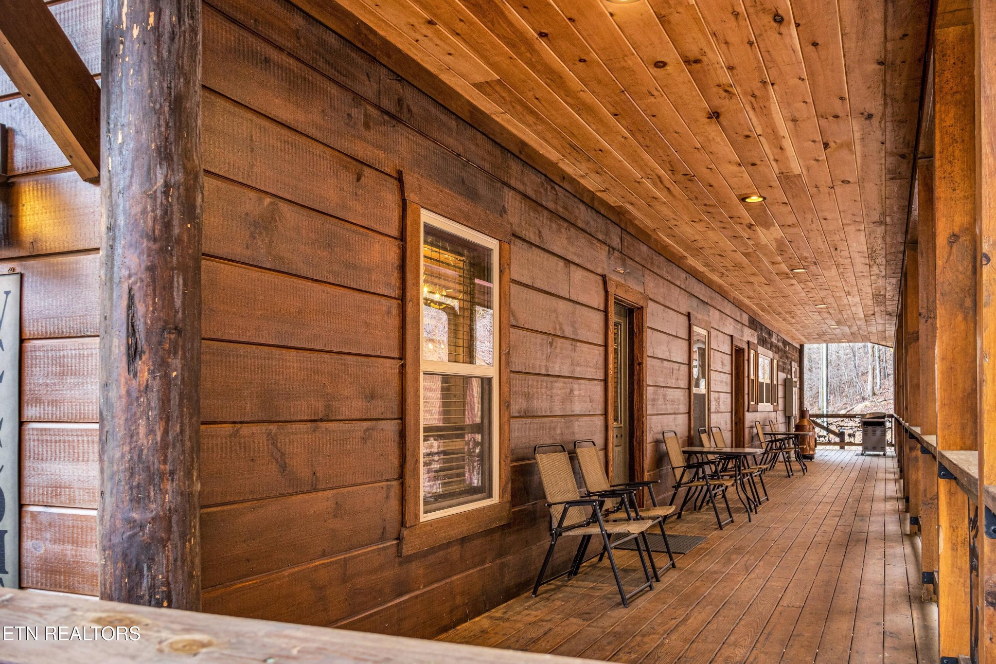 173 Rafter Road Tellico Plains, TN 37385 - Photo 15 of 49 a view of a balcony with chairs