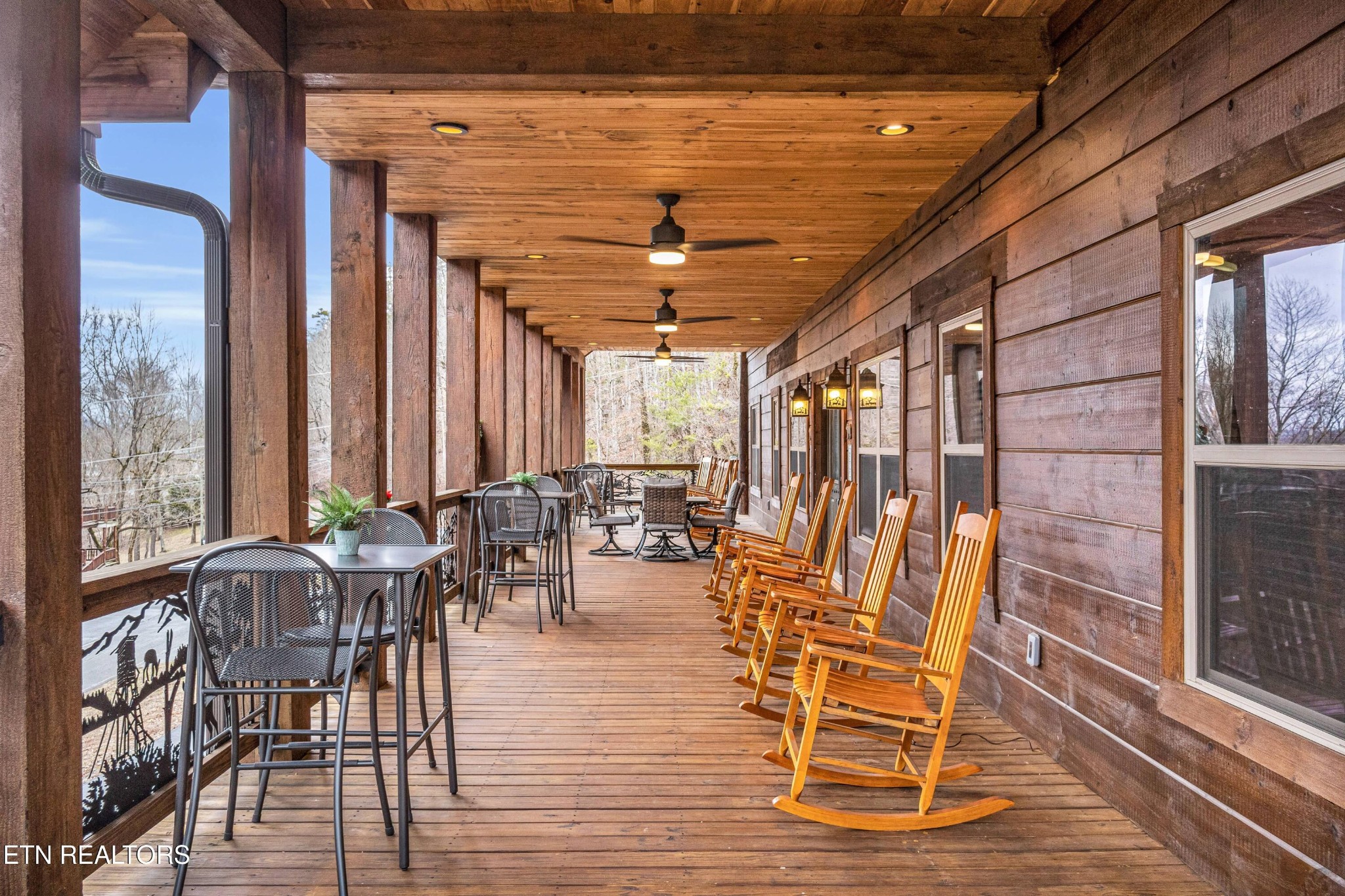 173 Rafter Road Tellico Plains, TN 37385 - Photo 17 of 49 a view of a dining room with furniture window and outside view