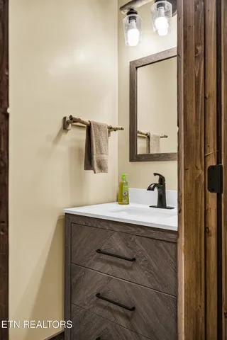 a view of a building with a table and chairs