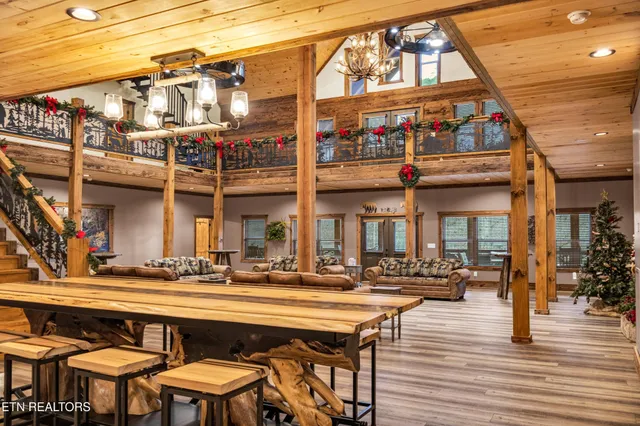 a front view of a building with outdoor seating