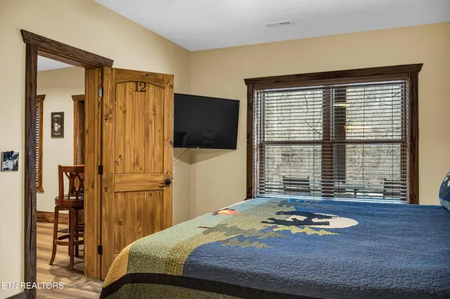 a room with furniture and air hockey table