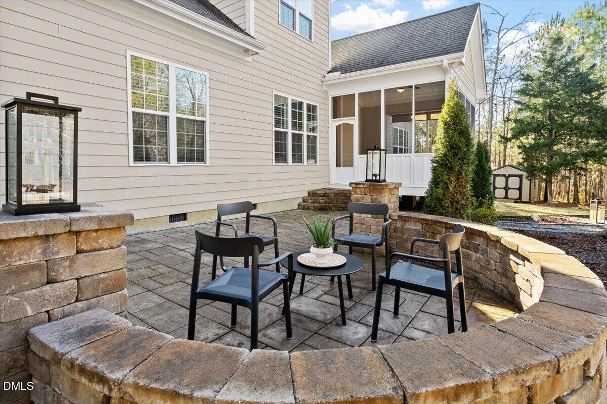1321 Cedar Grove Road Pittsboro, NC 27312 - Photo 12 of 82 a view of a house with backyard and sitting area