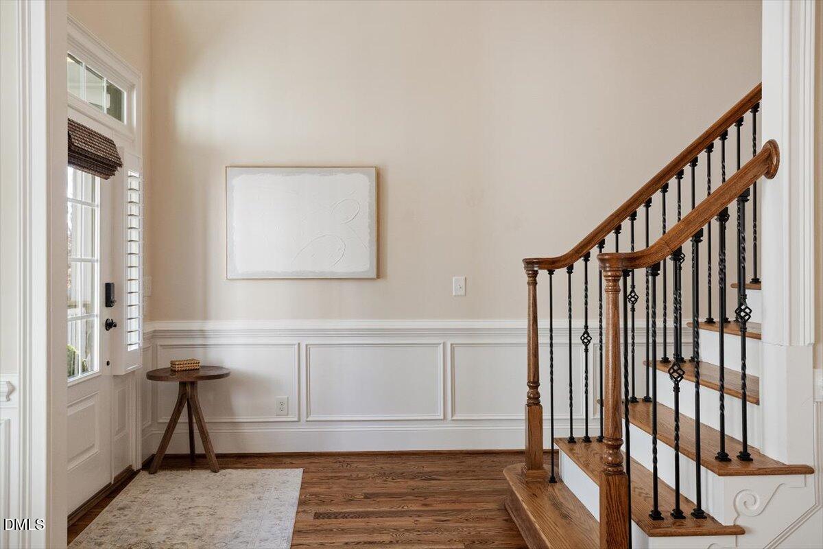 1321 Cedar Grove Road Pittsboro, NC 27312 - Photo 20 of 82 a view of a hallway with wooden floor and staircase