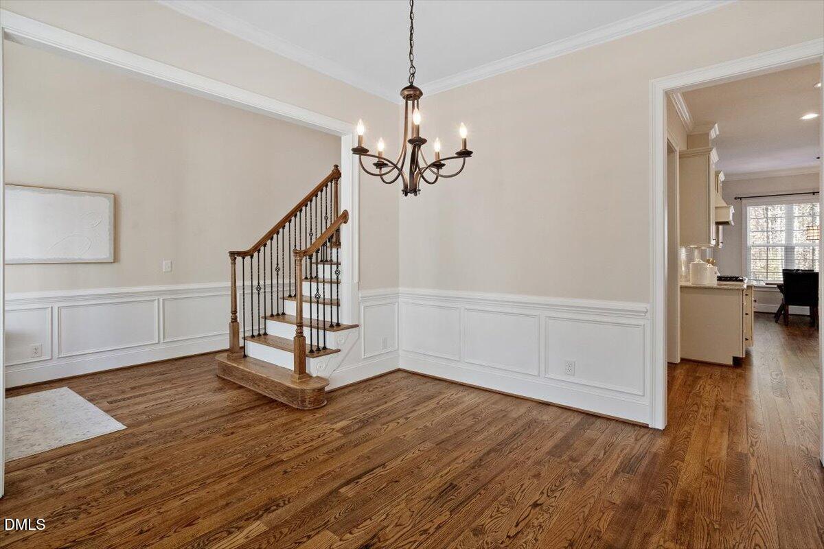1321 Cedar Grove Road Pittsboro, NC 27312 - Photo 24 of 82 a view of a livingroom with wooden floor and stairs
