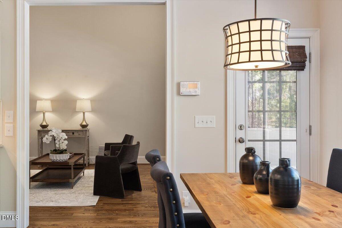 1321 Cedar Grove Road Pittsboro, NC 27312 - Photo 50 of 82 a view of a dining room with furniture and window