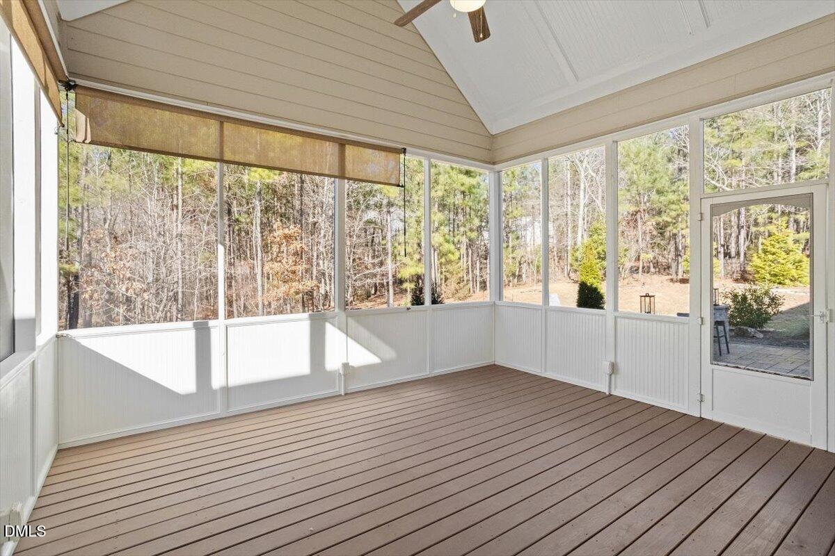 1321 Cedar Grove Road Pittsboro, NC 27312 - Photo 52 of 82 a view of empty room with wooden floor and fan