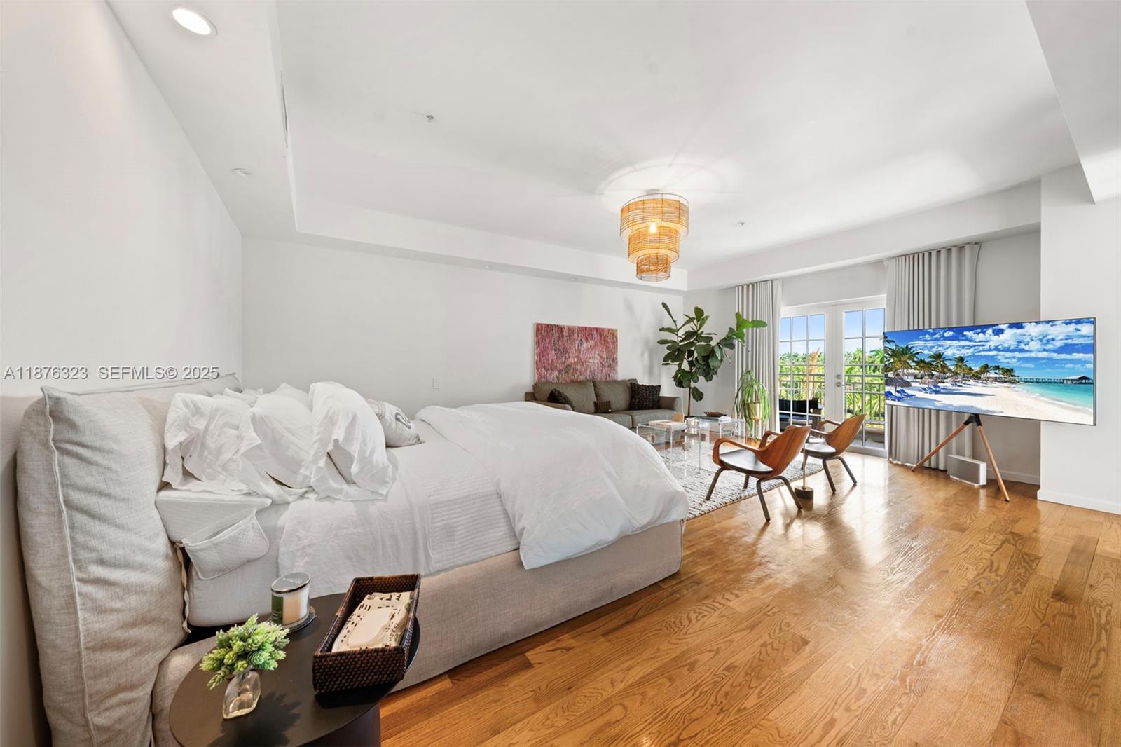 1415 Sunset Harbour Drive, Unit 406 Miami Beach, FL 33139 - Photo 14 of 83 a bedroom with furniture and a table