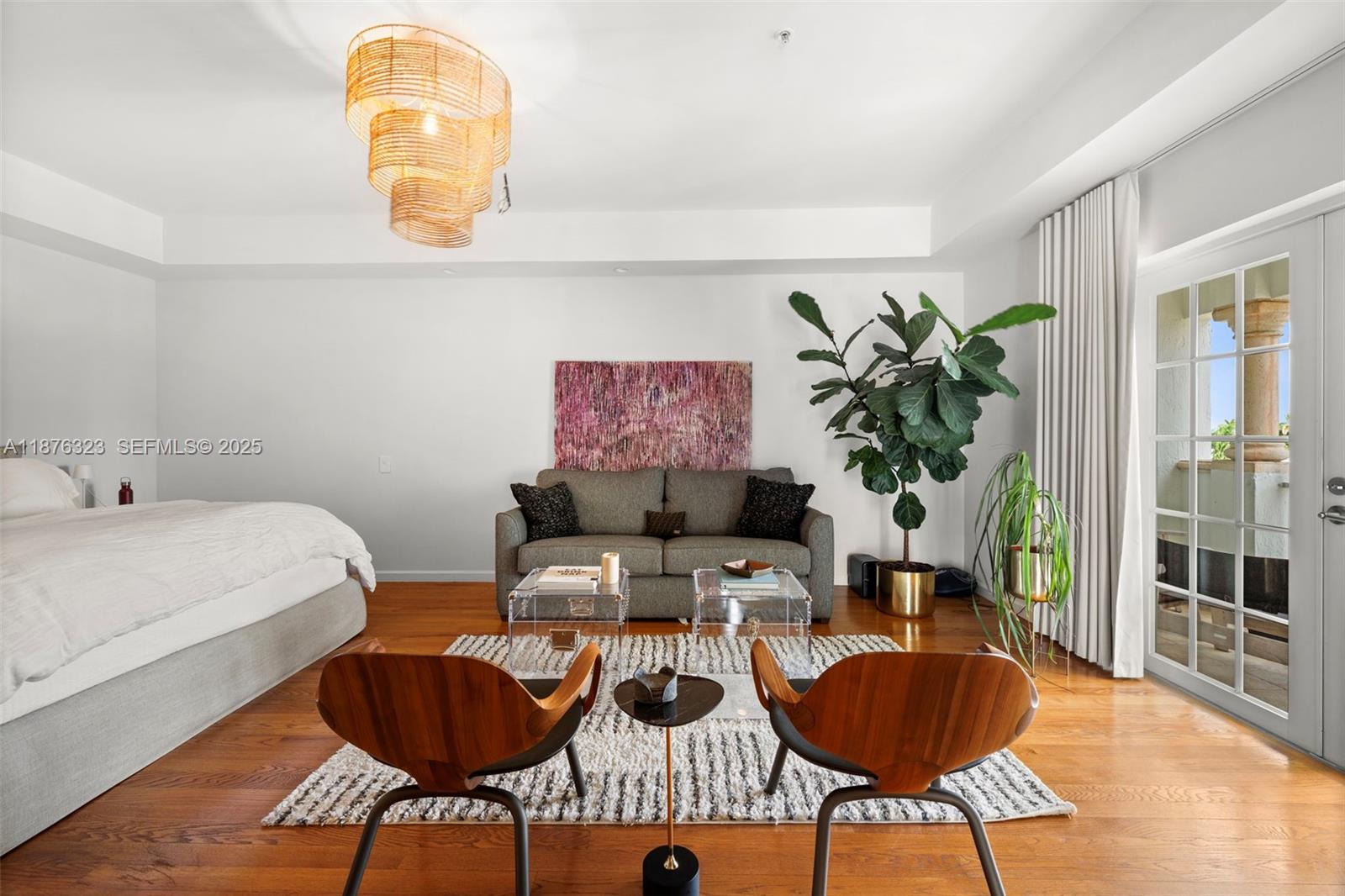 1415 Sunset Harbour Drive, Unit 406 Miami Beach, FL 33139 - Photo 16 of 83 a living room with furniture and a potted plant
