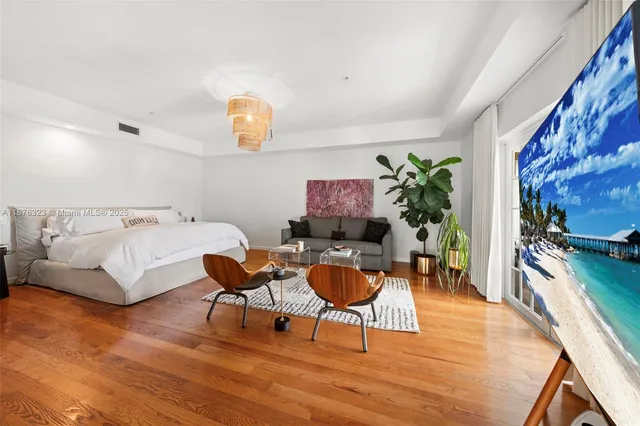 a white bath tub sitting next to a window