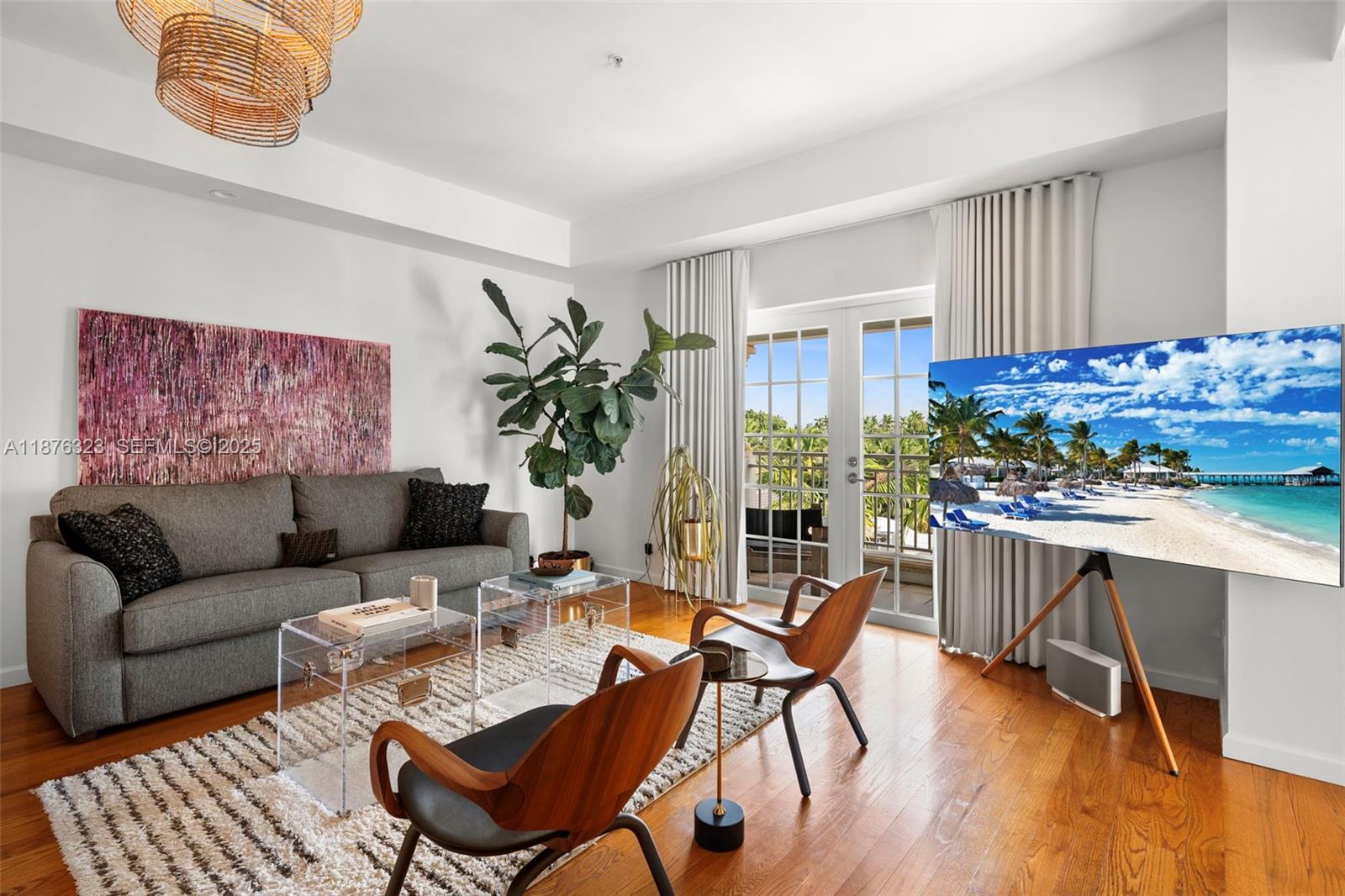 1415 Sunset Harbour Drive, Unit 406 Miami Beach, FL 33139 - Photo 18 of 83 a living room with furniture and a potted plant