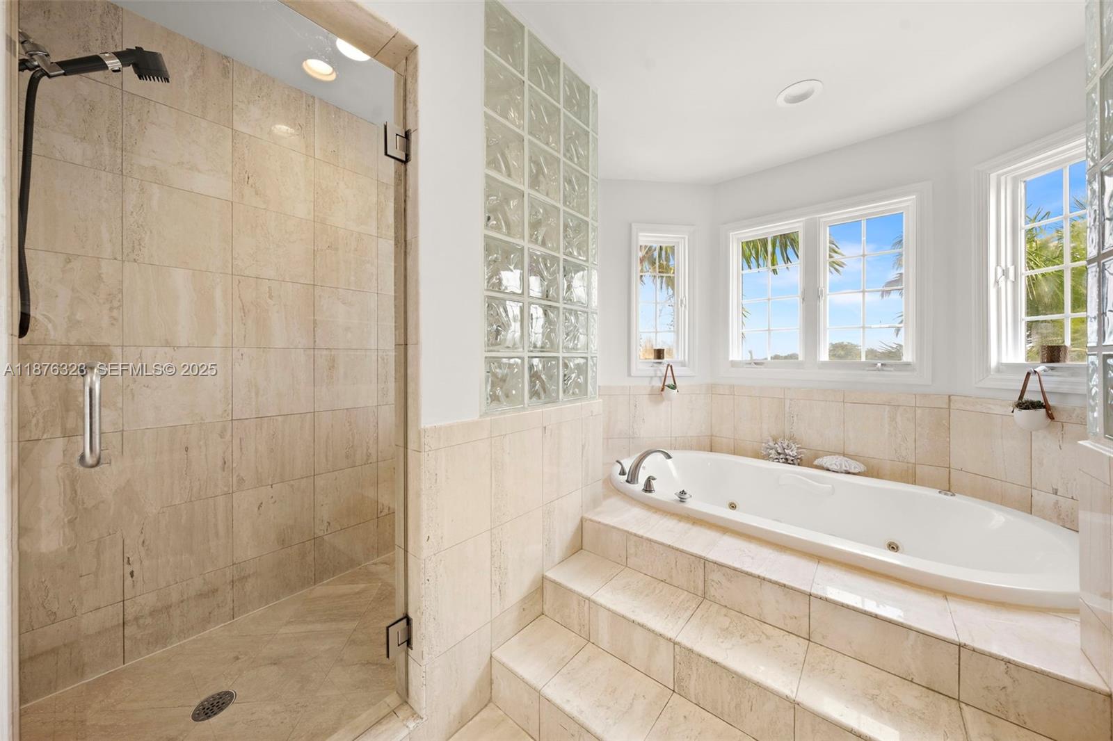 1415 Sunset Harbour Drive, Unit 406 Miami Beach, FL 33139 - Photo 23 of 83 a bathroom with a bathtub and shower