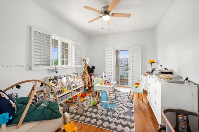a view of balcony with wooden floor and fence