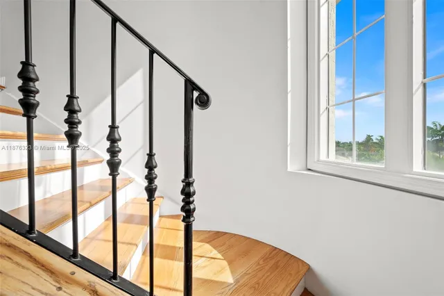 a view of balcony with furniture