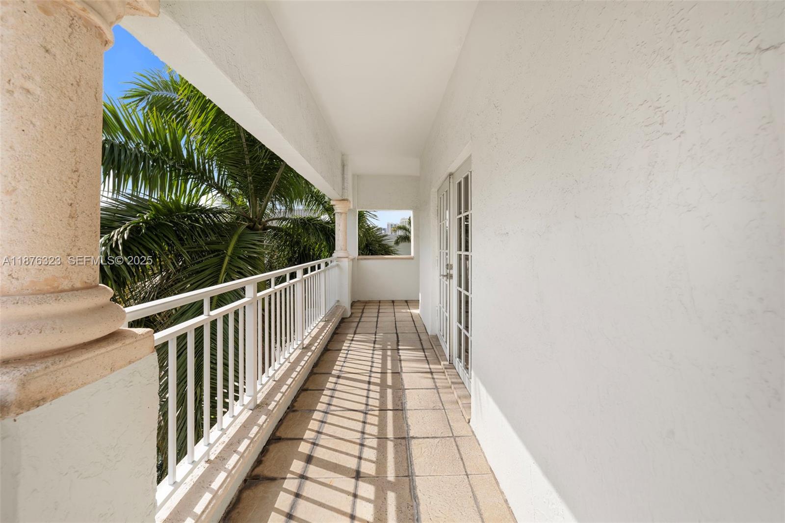 1415 Sunset Harbour Drive, Unit 406 Miami Beach, FL 33139 - Photo 40 of 83 a view of balcony with wooden floor and fence