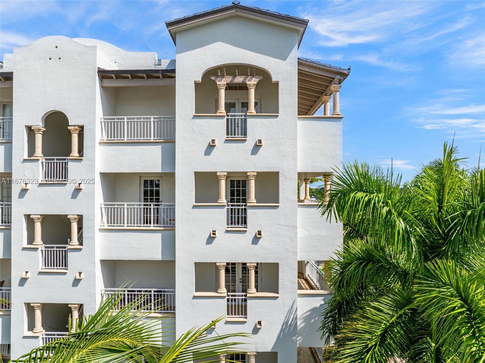 1415 Sunset Harbour Drive, Unit 406 Miami Beach, FL 33139 - Photo 74 of 83 a front view of a multi story residential apartment building with a yard