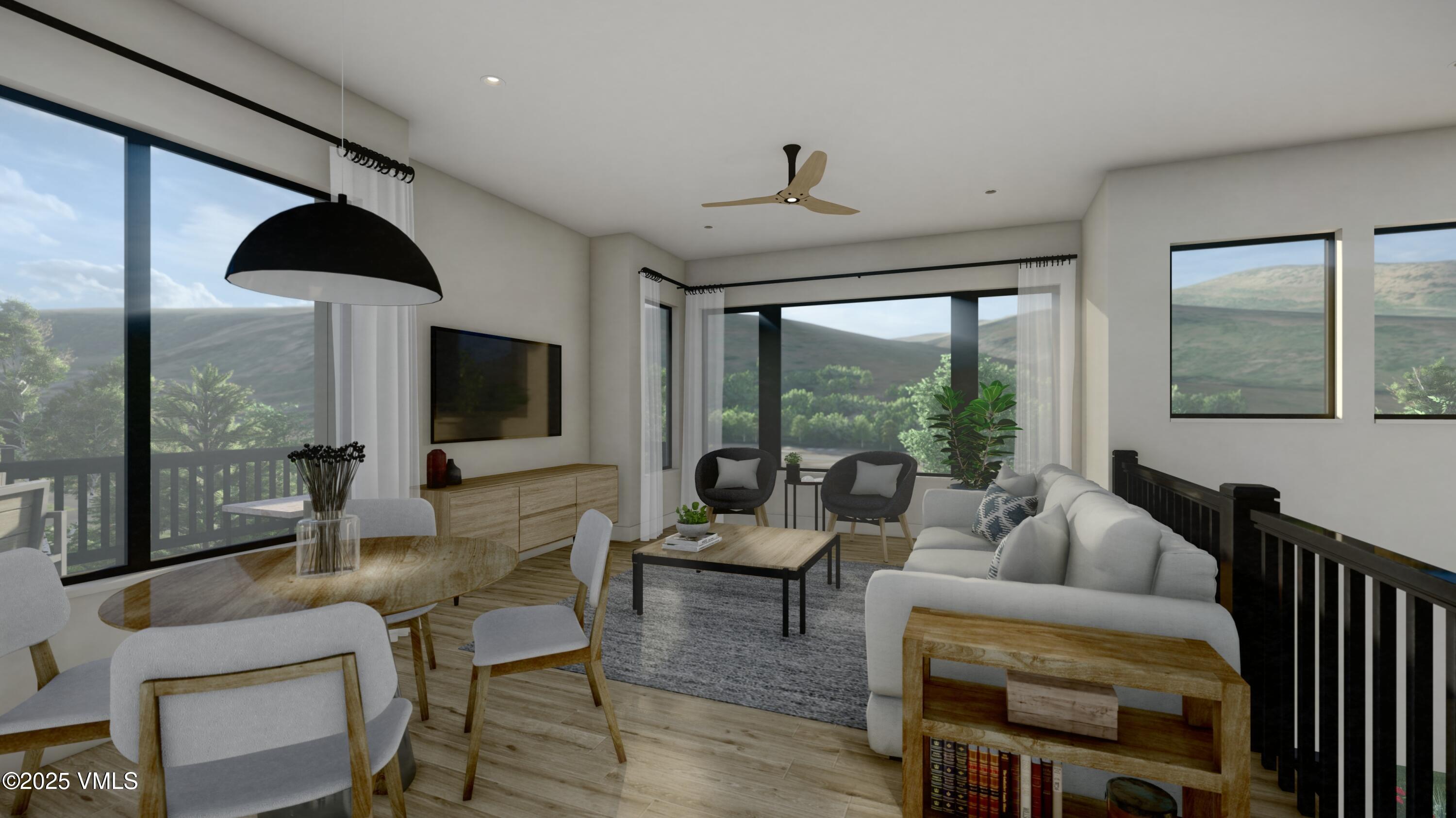 18 Silver Star Trail Minturn, CO 81645 - Photo 2 of 8 a living room with furniture and a flat screen tv