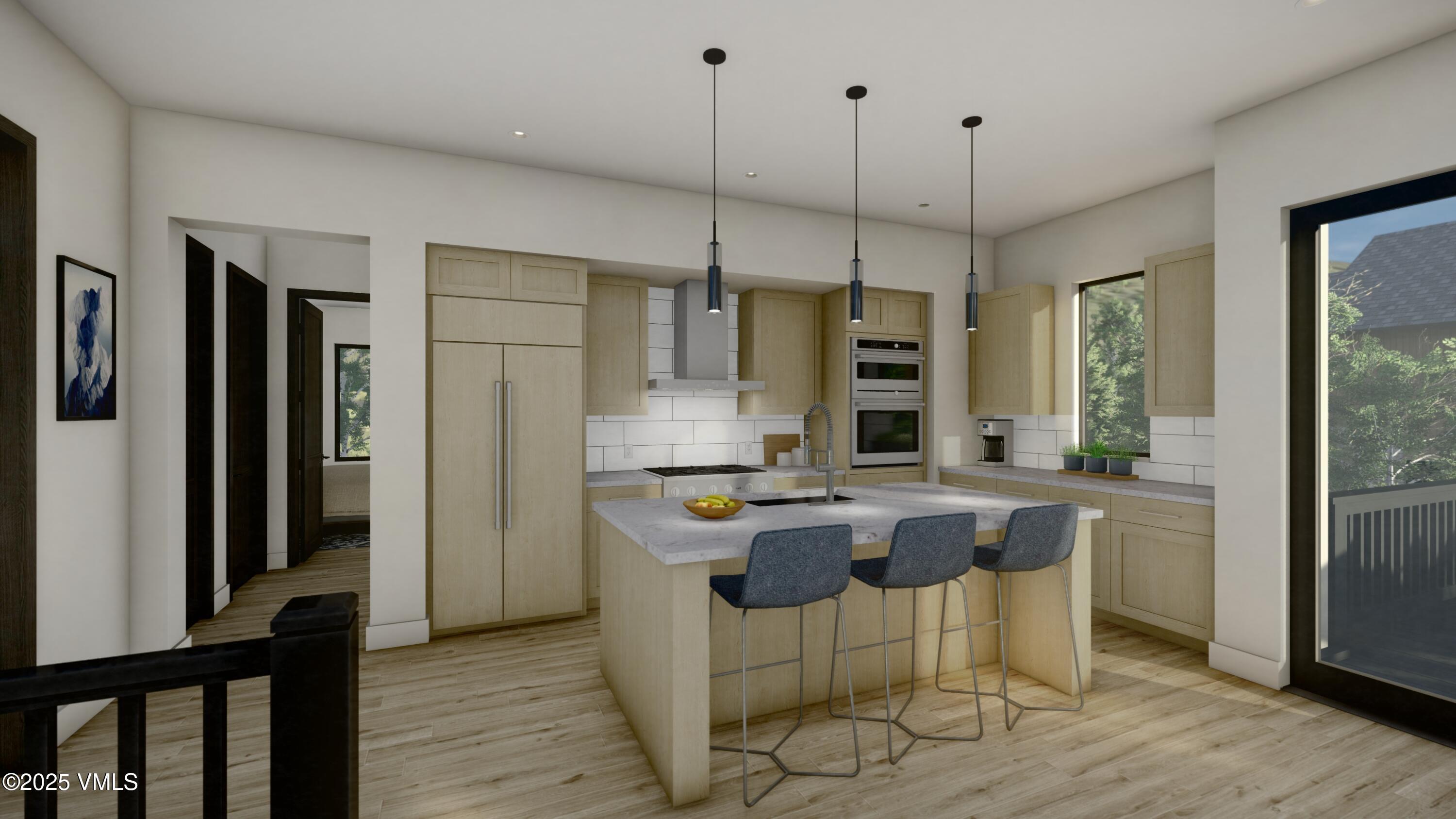 18 Silver Star Trail Minturn, CO 81645 - Photo 3 of 8 a kitchen with stainless steel appliances granite countertop a stove and refrigerator