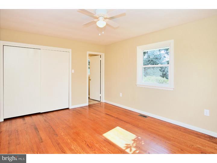 123 Sharp Road Avondale, PA 19311 - Photo 16 of 24 a view of an empty room with wooden floor