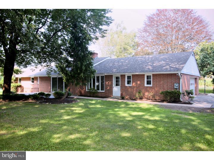 123 Sharp Road Avondale, PA 19311 - Photo 24 of 24 a view of a house with a yard and sitting area