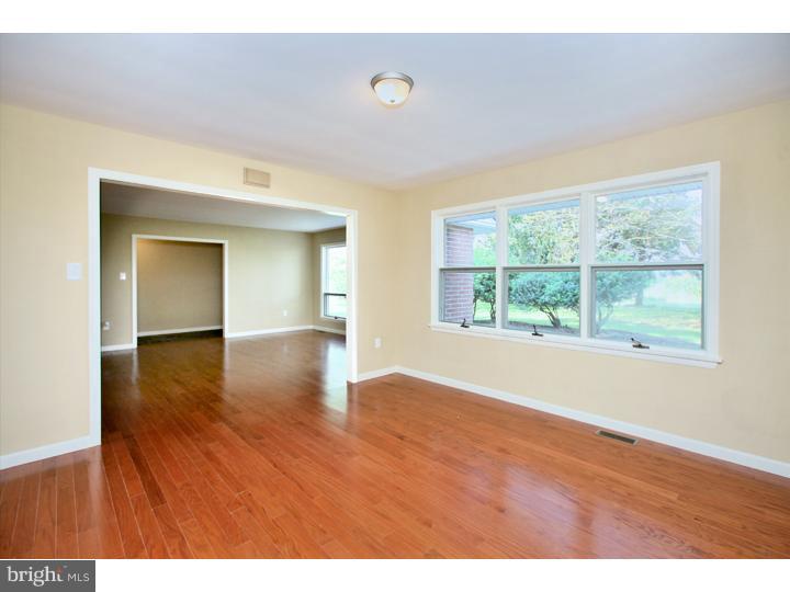 123 Sharp Road Avondale, PA 19311 - Photo 5 of 24 a view of empty room with wooden floor and fan