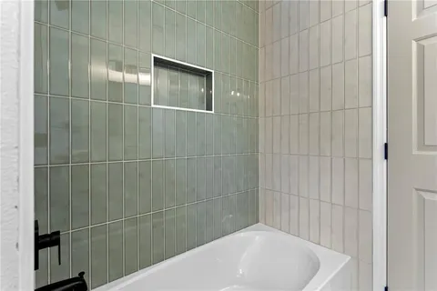 a bathroom with a bathtub