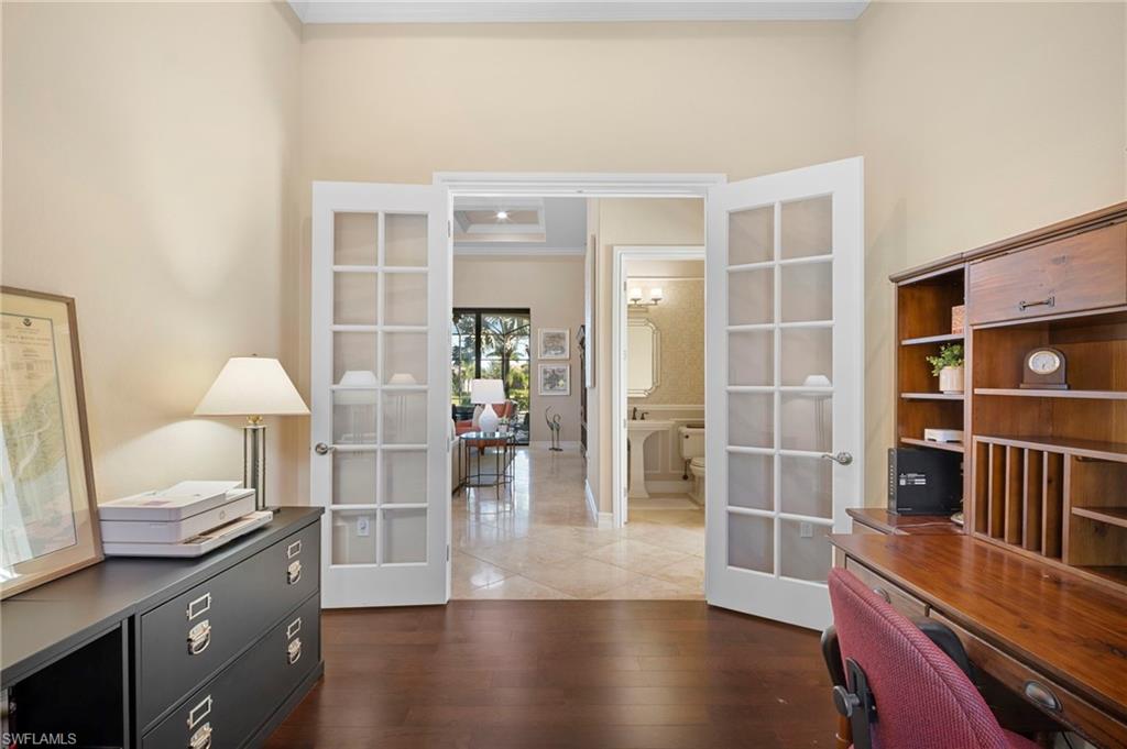 6482 Carema Lane Naples, FL 34113 - Photo 19 of 40 a view of livingroom with furniture and wooden floor