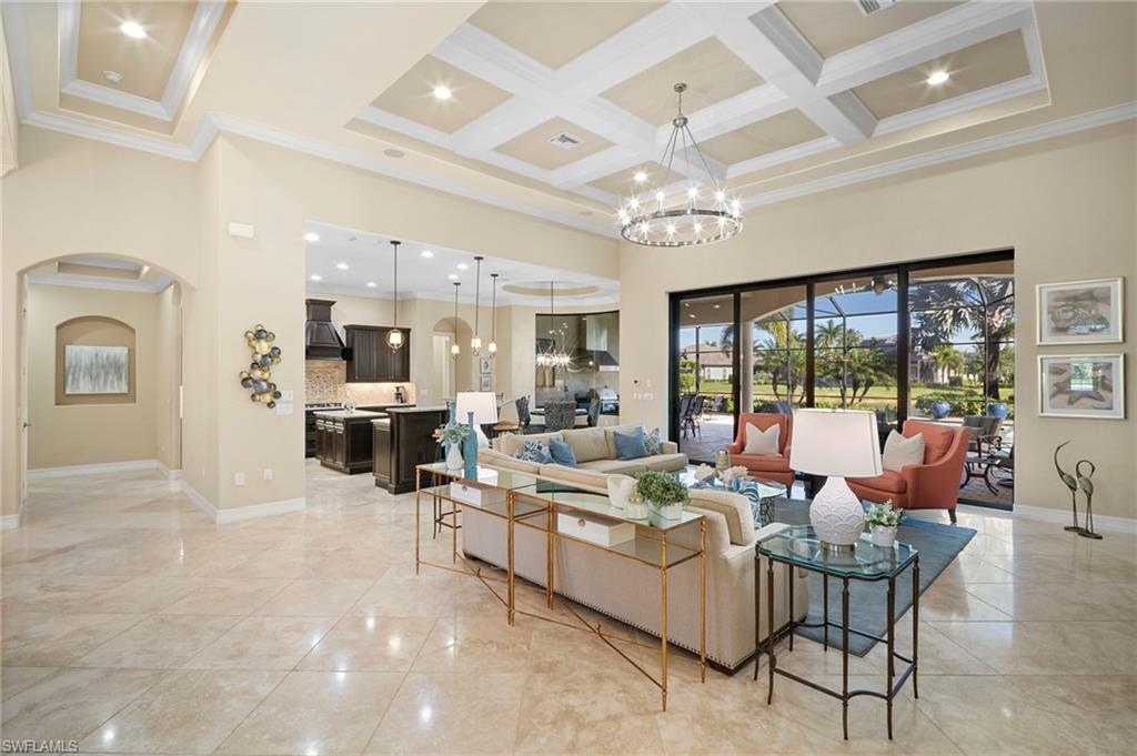 6482 Carema Lane Naples, FL 34113 - Photo 3 of 40 a living room with lots of furniture and a large window