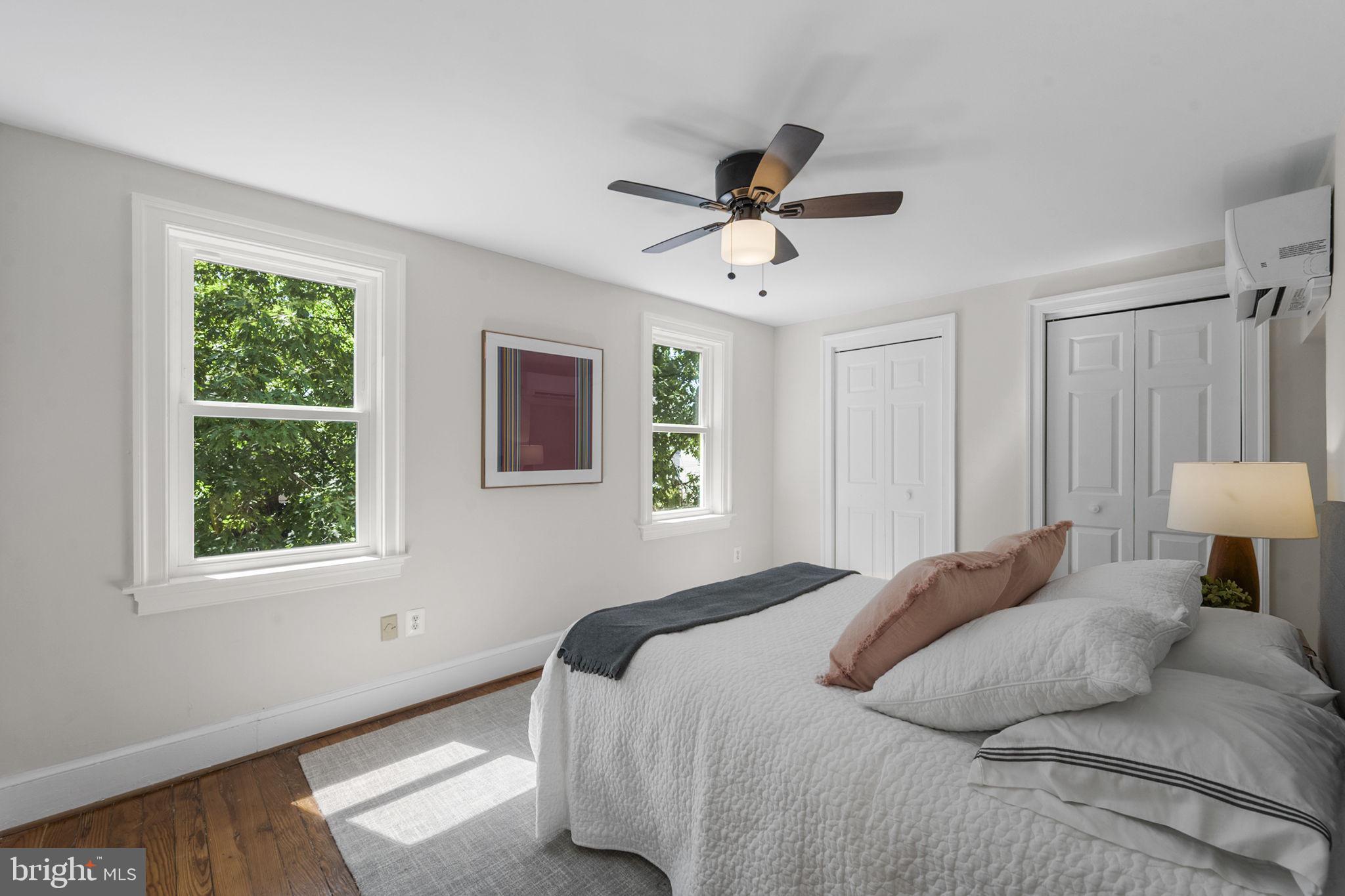 914 15th Street Southeast Washington, DC 20003 - Photo 20 of 37 a bedroom with a bed and a window