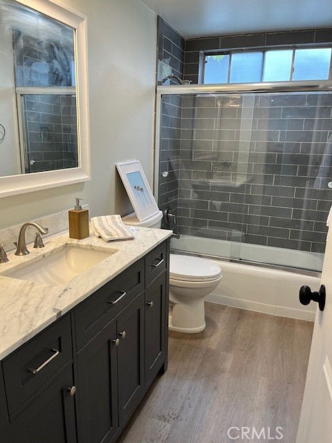 6952 Platt Avenue West Hills, CA 91307 - Photo 6 of 14 a bathroom with a sink a toilet and shower