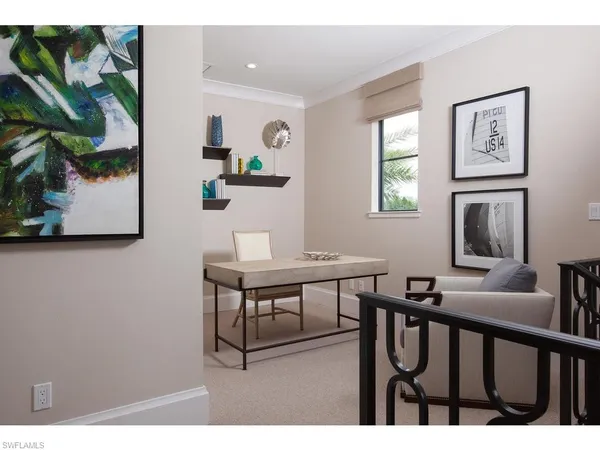 a view of a livingroom with furniture and window