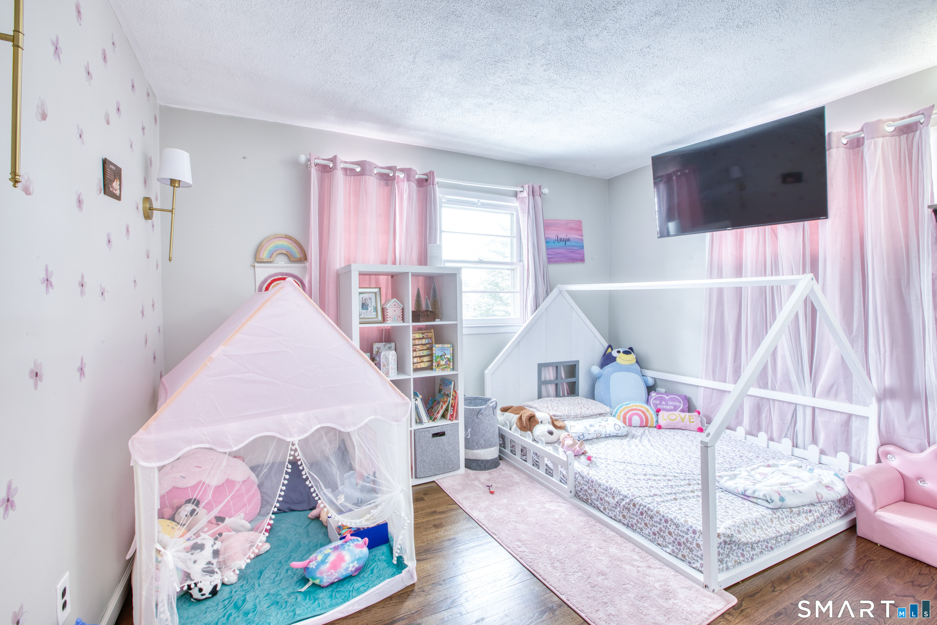 4 Edmond Road Bethel, CT 06801 - Photo 19 of 40 a bedroom with a bed and window