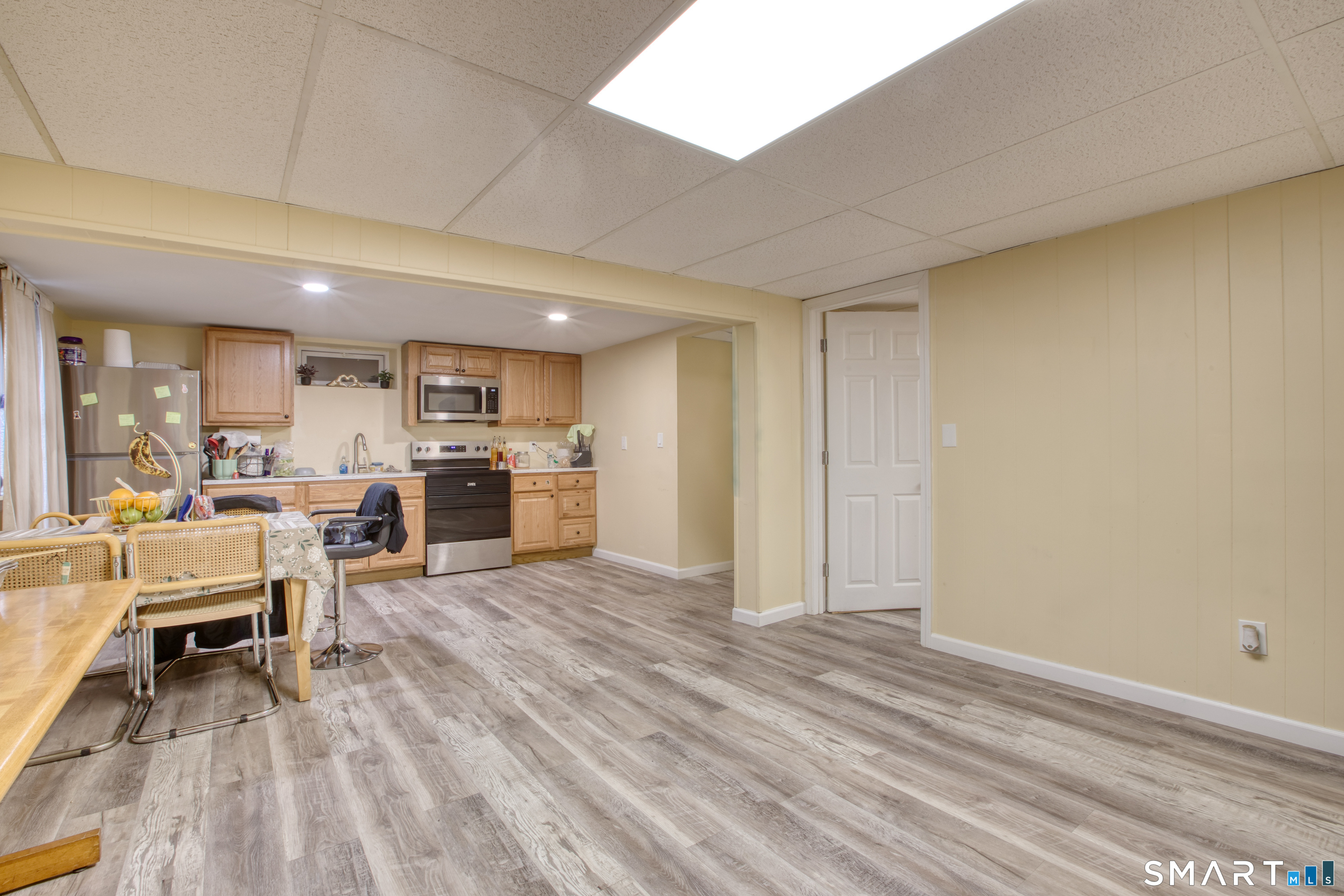 4 Edmond Road Bethel, CT 06801 - Photo 34 of 40 a view of kitchen with furniture and wooden floor