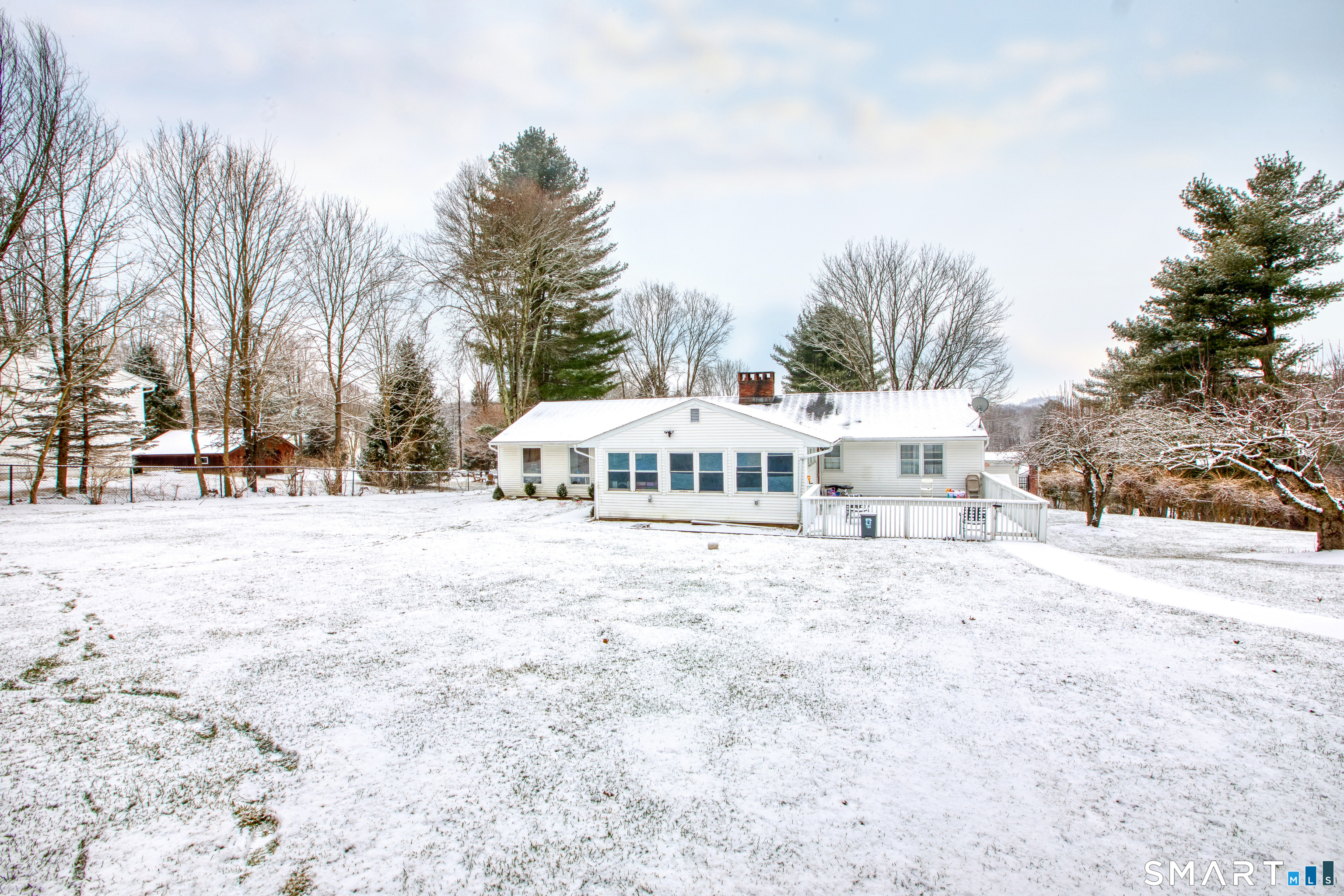 4 Edmond Road Bethel, CT 06801 - Photo 6 of 40 a view of a house with snow on the ground