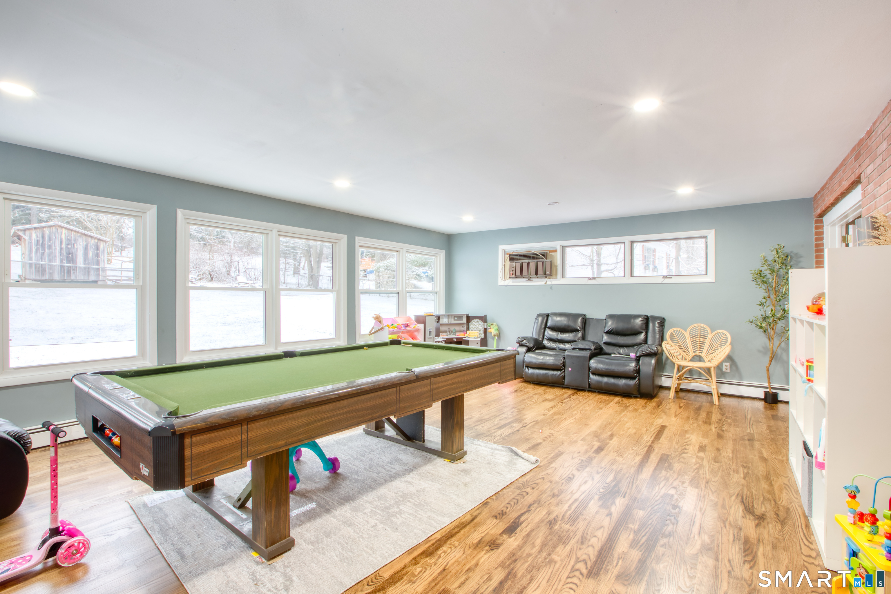 4 Edmond Road Bethel, CT 06801 - Photo 8 of 40 a living room with furniture and a table